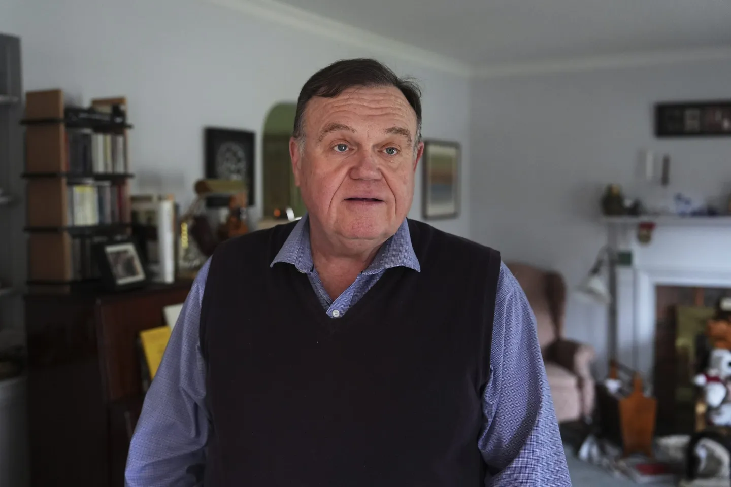 Michael Montgomery poses at his home in Huntington Woods, Mich., Friday, April 18, 2025.