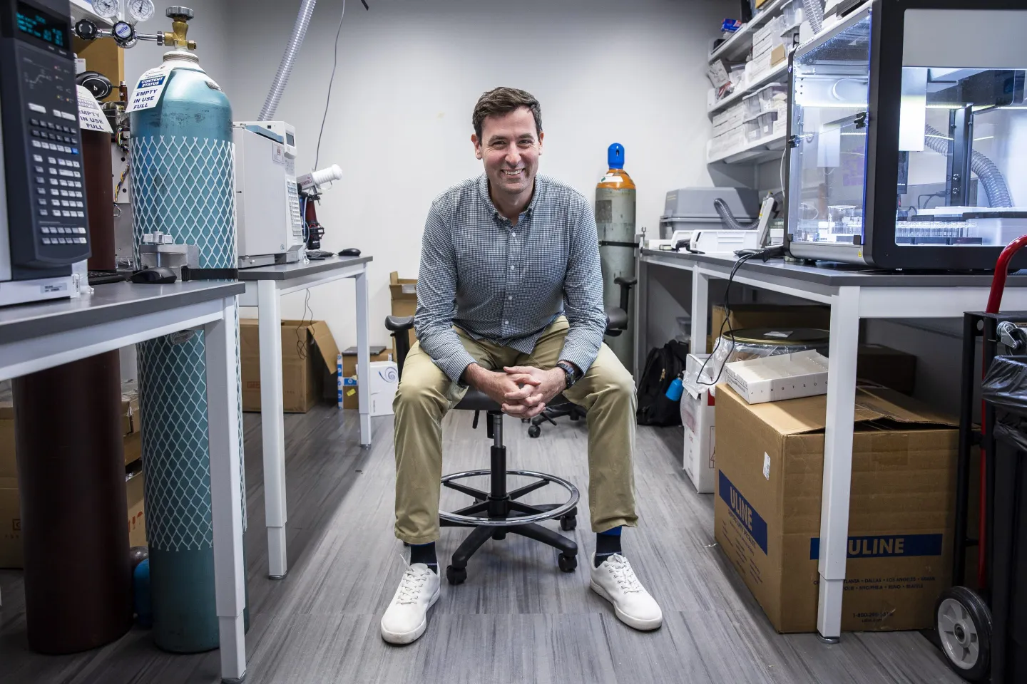 Alex Wiltschko poses for a portrait in his lab