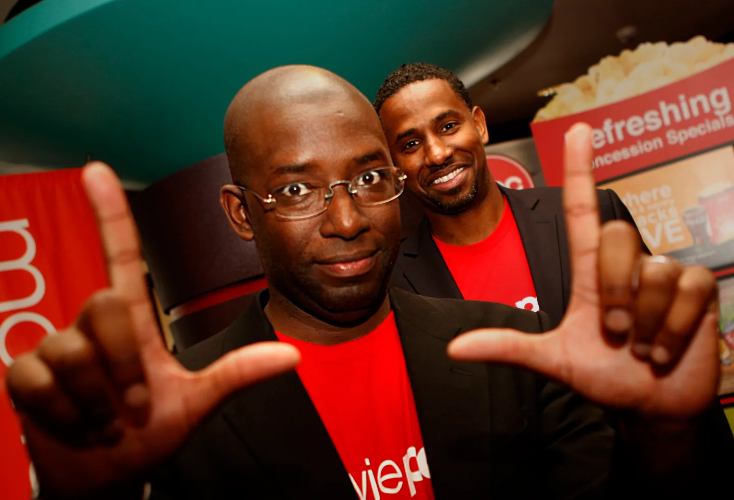 MoviePass co-founders Stacy Spikes (front) and Hamet Watt (back) at AMC in San Francisco, Calif., on Wednesday, January 29, 2011. MoviePass is a new mobile service that lets people go to as many movies as they want for $50 a month. They use their phone as their ticket into the theater. They also get to see trailers and other promotions through the mobile service. (Photo By Liz Hafalia/The San Francisco Chronicle via Getty Images)