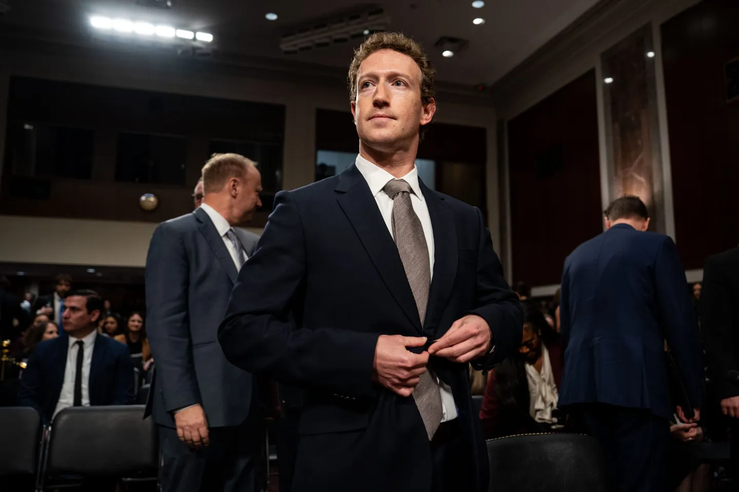 Mark Zuckerberg, chief executive officer of Meta Platforms Inc., center, arrives following a break during a Senate Judiciary Committee hearing in Washington, DC, US, on Wednesday, Jan. 31, 2024. Congress has increasingly scrutinized social media platforms as growing evidence suggests that excessive use and the proliferation of harmful content may be damaging young people's mental health.