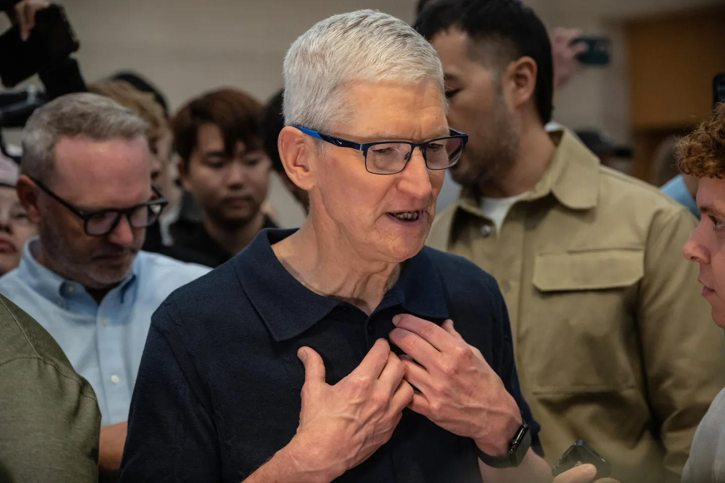 Tim Cook, chief executive officer of Apple Inc., speaks to members of the media during the first day of in-store sales of Apple's latest products at Apple's Fifth Avenue store in New York, US, on Friday, Sept. 20, 2024.