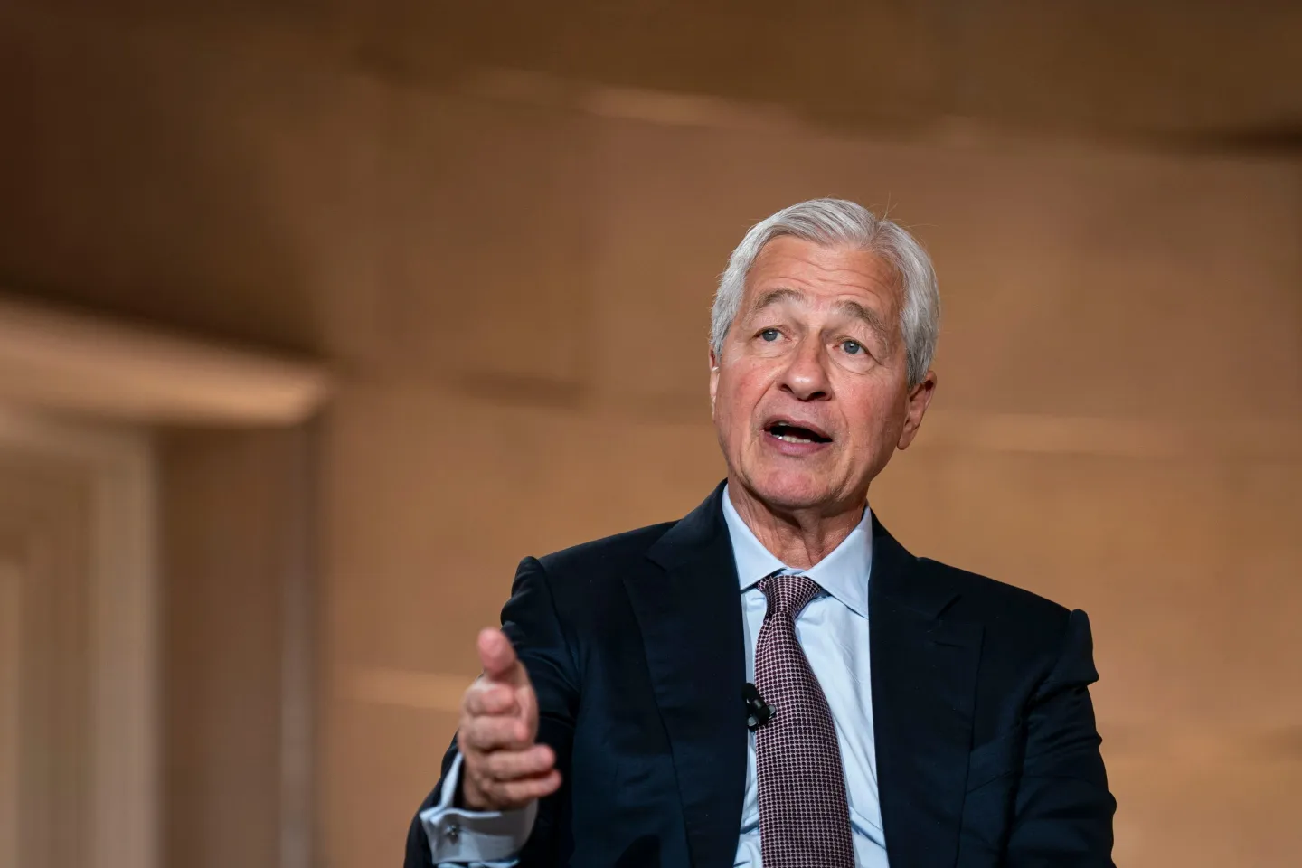 Jamie Dimon speaks into a microphone