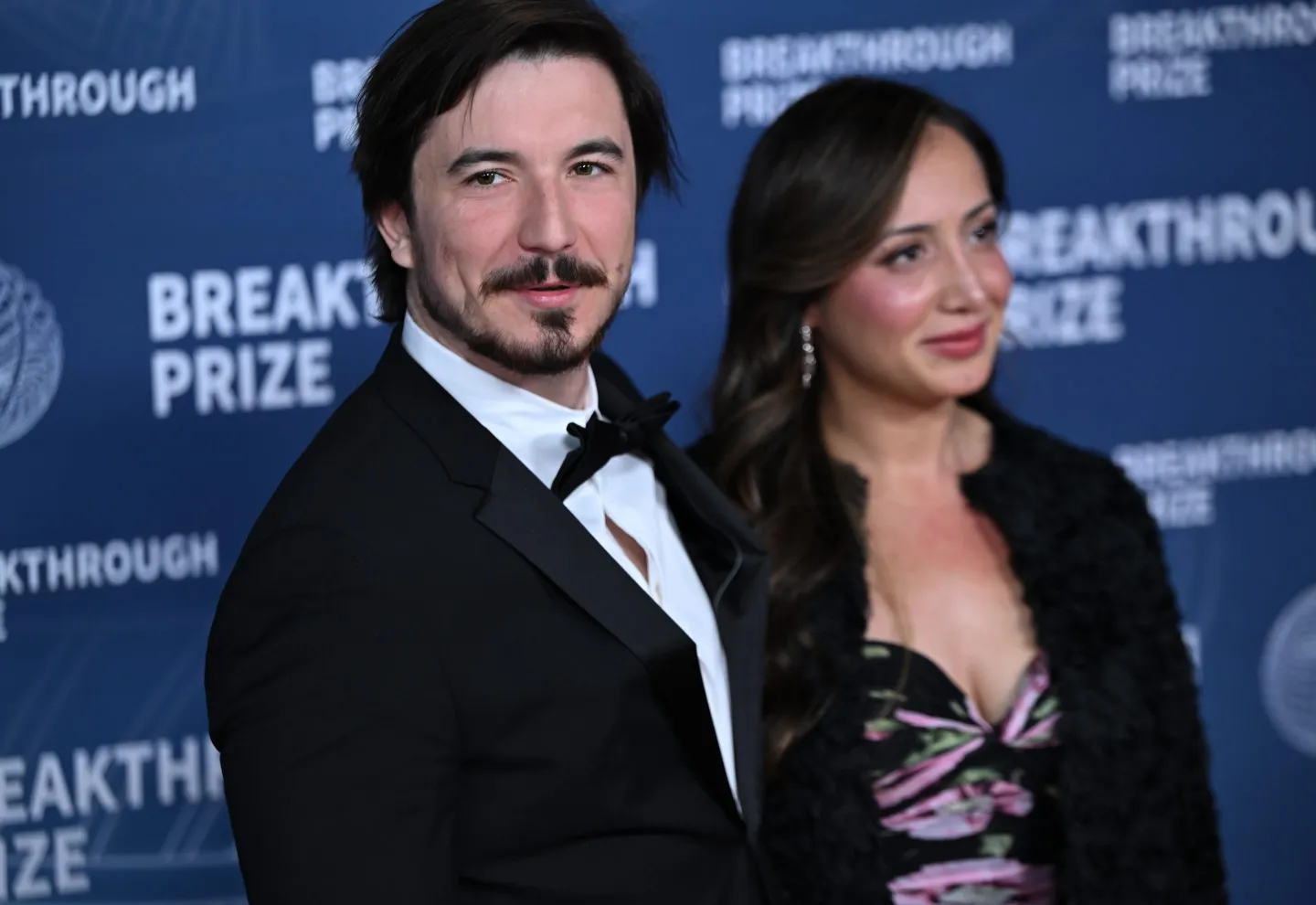 Vladimir Tenev (L) and Celina A. Tenev (R) pose for a picture on the red carpet at the 11th Annual Breakthrough Prize Awards and Ceremony at the Barker Hangar in Santa Monica of Los Angeles, California, United States on April 5, 2025.