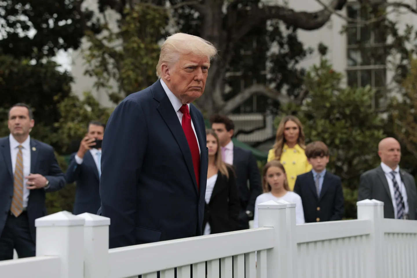 Donald Trump talks to reporters durning the White House Egg Roll on the South Lawn